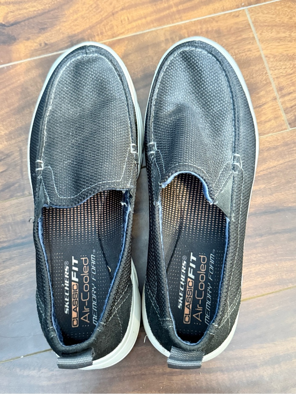 Skechers Men's Black Slip-On Loafers with White Sole
